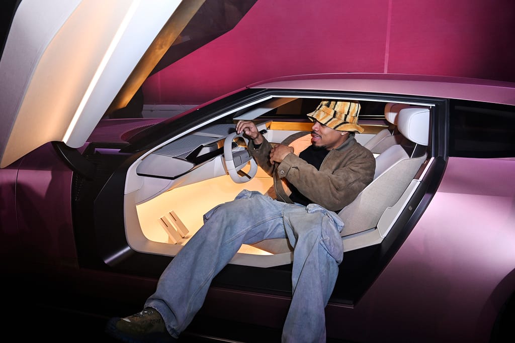 chance sitting in new jaguar